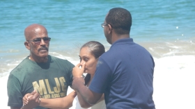Pastor Rian Williams baptises a candidate