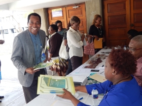 Dr. Peter Stroude registers at COTN Trinidad and Tobago District Assembly 2015