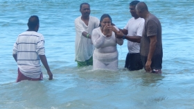 Pastor Chaitram Babooram baptises a candidate