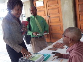 Dr Gelien Matthews registers at COTN Trinidad and Tobago District Assembly 2015