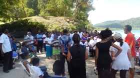 Pastor Peter Stroude addresses baptismal candidates